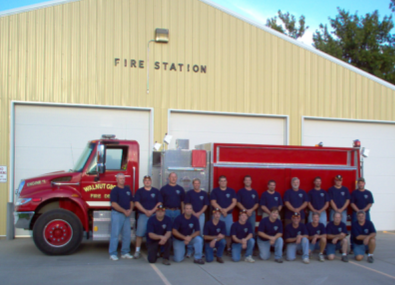 Image of Fire truck and all fire personnel